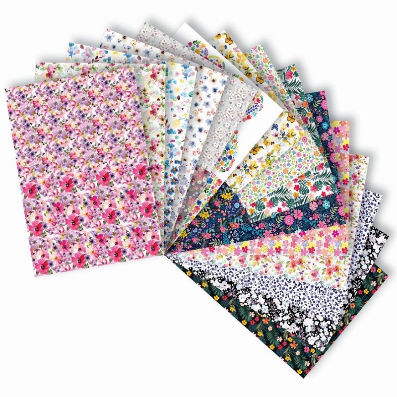 Lilleliste mustritega disainpaberite segupakk.