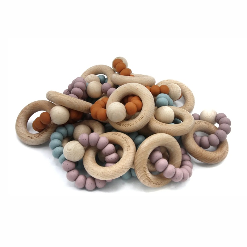 The Cotton Cloud silikoonist ja naturaalsest puidust ohutu närimisrõngas beebile katsikuks