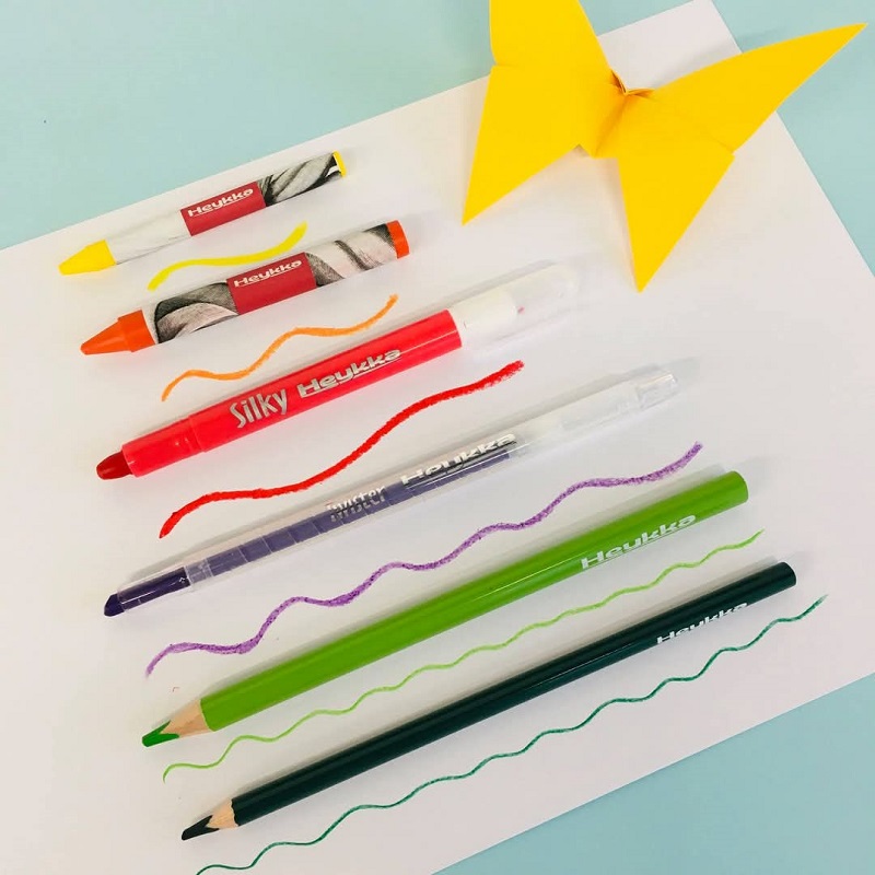 heykka kolmnurksed ergonoomilised värvipliiatsid teritajaga.