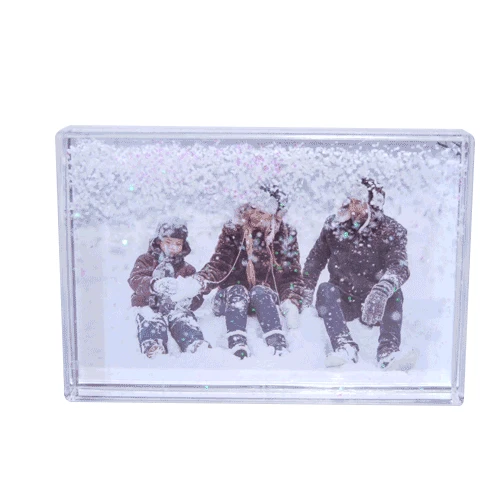 vahetatava pildiga fotoga pildiraam langeva lumega jõulukingitus töökaaslasele lapsele vanavanematele tüdrukule poisile