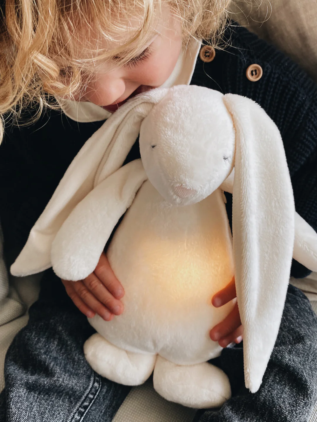 Nutusensoriga rahustav MOONIE 2.0 kaisujänes beebile roosa müra ja öölambiga