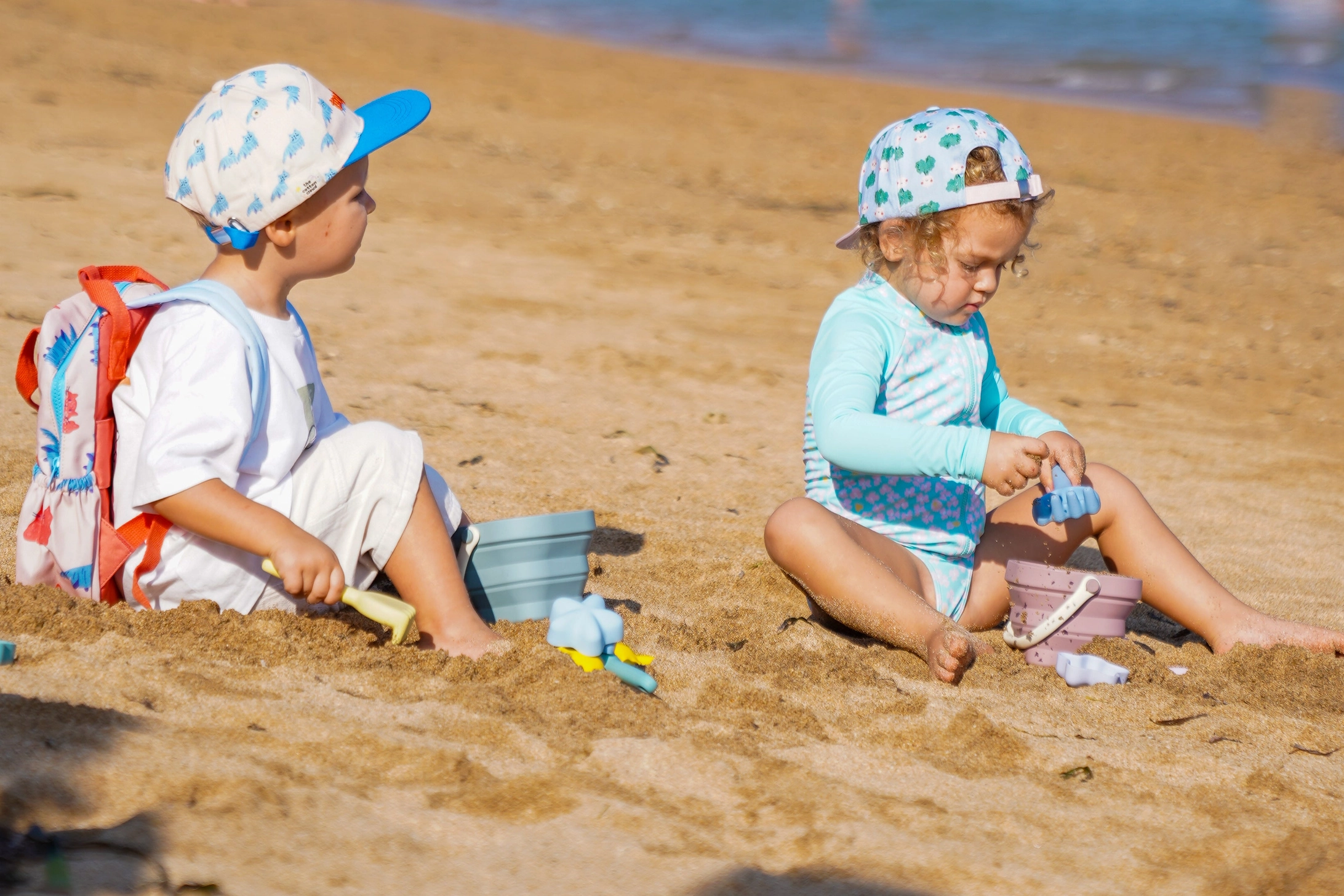 The Cotton Cloud silikoonist rannamänguasjade komplekt MAUVE – kokkupandav ämber ja vormid